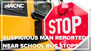 Man seen talking to female students at school bus stops in south Charlotte, police say