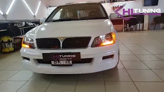 Mitsubishi Lancer Cedia улучшение света Aozoom A12