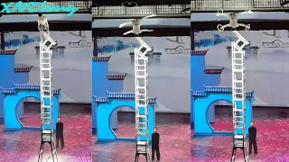 Acrobats perform handstands and stunts on stacked chairs in the air
