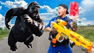 Battle Nerf War: Salesman Ice Cream With Blue Police Nerf Guns Robbers Group MONKEY BATTLE