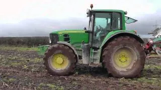 Ploughing with John Deere 6930 and New Holland TS135.