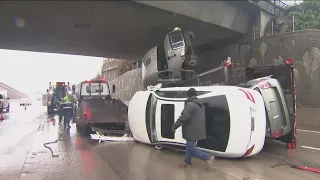 Widespread rain, flooding and high surf hits California creating a mess on San Diego roads