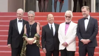 Christopher Nolan and more on the red carpet for the Premiere of Le Grand Bain in Cannes