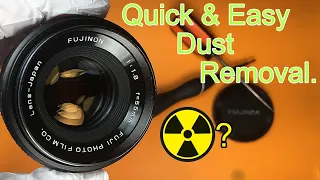 Cleaning out dust in a Fujinon 55mm F1.8 lens and testing for gamma radiation.