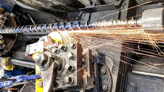 Grinding an Extruder screw after adding metal to the worn out threads with wire feed feed welder.