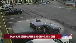 Man arrested after shooting at motel