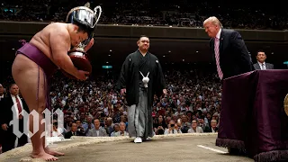 Watch Trump present the 'President's Cup' to sumo tournament winner in Japan