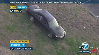 CHASE: Car drives through fence in San Fernando Valley during pursuit | ABC7