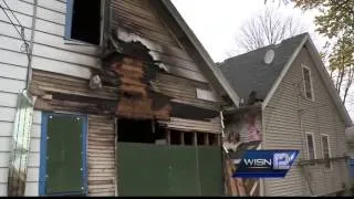 Man rushes in burning home to save elderly woman