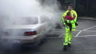 Watch This Officer Pull Two Babies from a Burning Car