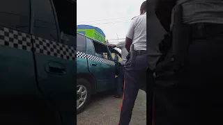 Bad boy police ruff up Jamaican taxi driver