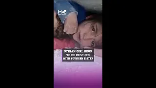 Syrian child begs to be rescued from the rubble with her younger sister