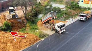 Starting Update Project Building land Filling up,Truck Unloading Stone & Dozers Push Soil Mixed Rock