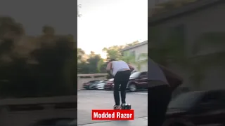 6’4” Giant on Modded Kids Razor Escooter