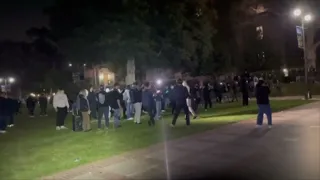 Watch as dueling groups of protesters fight each other at UCLA