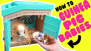 Little Live Pets Mama Surprise Guinea Pig with 3 Surprise Babies with Encanto Mirabel and Isabela