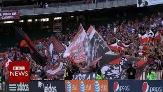 Why do these US football fans chant in Spanish? - BBC News