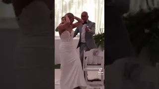 Cutting off her long hair and shaving her head during her wedding reception.