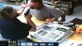 Watch: Liquor store cashier pulls gun on would-be robber