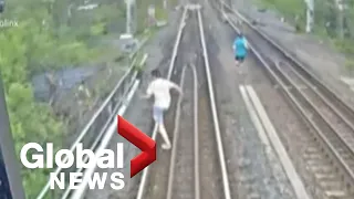 3 young people narrowly escape being hit by GO train west of Toronto: video