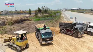 New project updating by Dozer KOMATSU D31A using technique skill pushing Rock soil to filling land