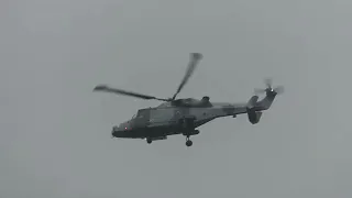 AW159 Wildcat helicopter, based at RNAS Yeovilton, makes a low level pass