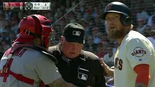 STL@SF: Umpire exits after being hit by foul ball