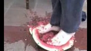 crushing watermelon