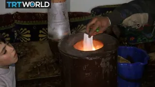 The War in Syria: Residents find ways to keep warm in winter