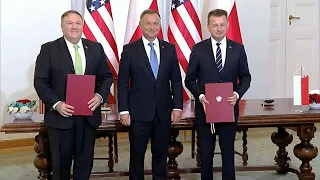 Pompeo and Polish Defence Minister sign agreement on enhanced defence cooperation | AFP