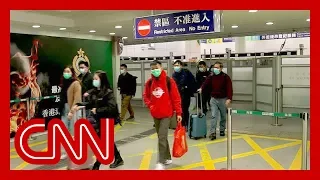 Hong Kong restricts border to contain Wuhan coronavirus