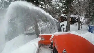 Snow blowing out about 5 driveways.  A long video