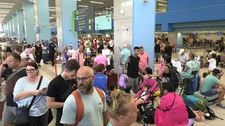 Travellers at Rhodes airport waiting to leave Greek island | AFP