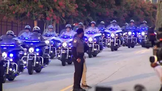 Trump's motorcade makes its way through Atlanta for his surrender for GA elections charges