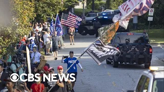 Protesters gather ahead of Trump's expected surrender in Georgia