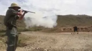 Classic double rifle against charging Cape buffalo target