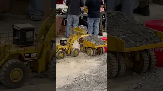 RC construction | Cat loader and dump truck at Cabin Fever Expo