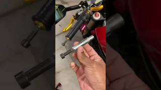 How to remove a stuck rizoma bar end mirror adapter?