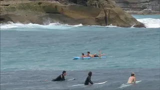 Lifeguard Noah Finnimore rescuing a boy at Bronte Beach - 19.12.2020 - By Cora Bezemer