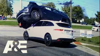 Red Light Runner Launched Into the Air, BARELY Misses Pedestrian | Road Wars | A&E