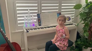 Distinction Grade 2 piano now practise for Grade 3 young girl