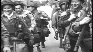 US 507th Regiment, 82nd Division paratroopers receive parachutes and sham attack ...HD Stock Footage