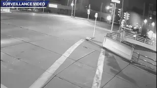 Surveillance Video Shows Car Speed Through Intersection, Crash