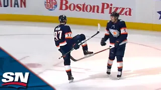 Connor McDavid Goes To Work Behind The Blackhawks' Net And Finishes With A Backhand Score