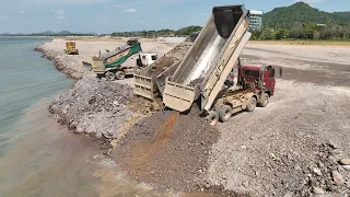 Dozer KOMATSU Push Stone With DumpTruck TRAGO HYUNDAI SCANIA 25,5TON Transport Stone Filling Sea