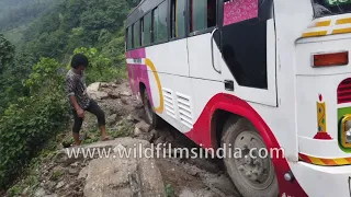 Hanging by the cliff: Local Nepalese bus stuck due to incessant rains en route Ghandruk