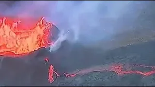 A UFO flies over an erupting volcano in Iceland