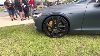 Elegant Polestar EV One EV Driving Through A Lamborghini’s “Jet Wash”.