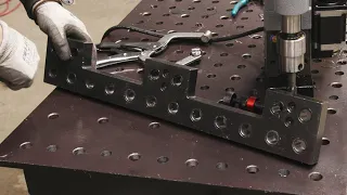 This Tool Helps You Drill Holes In Your Welding Table.