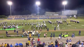 Pride of Baker Marching Band performing their halftime show Radioactive.